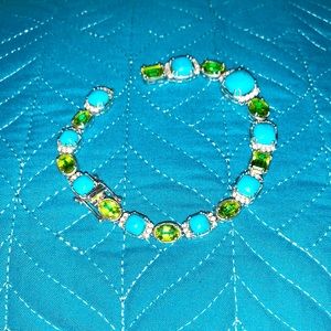 Sterling silver and precious gemstone bracelet.